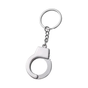 Llavero táctico policial con diseño de esposas.
